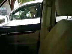 Mature woman in stockings masturbates with a glass wand
